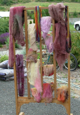 Colorful wool on rack drying